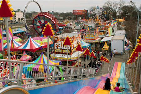 Atlanta, GA, USA - March 15, 2014:  High-angle view of carnival rides and tents packed into tight space at the annual Atlanta Fair. のeditorial素材