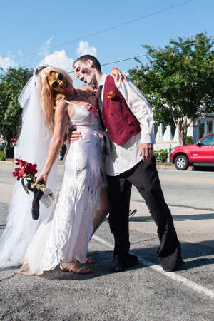 Atlanta, GA, USA - July 25, 2015:  A zombie bride and groom pose as they take part in the Atlanta Zombie Pub Crawl in Atlanta, GA on July 25, 2015.のeditorial素材
