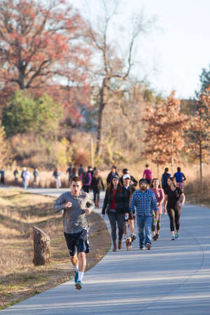 Atlanta, GA USA - December 5, 2015:  People walk and run along the Atlanta Beltline recreational area in the Old Fourth Ward on December 5, 2015 in Atlanta, GA.のeditorial素材