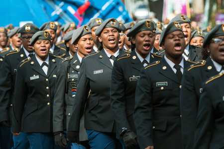 Atlanta, GA, USA - November 11, 2017:  A group of high school junior ROTC cadets sound off while walking in the Georgia Veterans Day Parade, on November 11, 2017 in Atlanta, GA.のeditorial素材