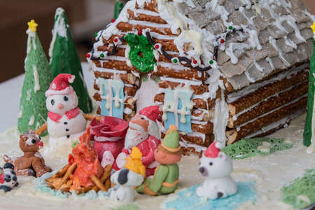 Suwanee, GA, USA - December 15, 2018:  A gingerbread house scene sits on display at the Jingle in the Park Christmas Festival at Suwanee Town Center Park, on December 15, 2018 in Suwanee, GA.のeditorial素材