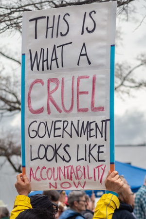 Monroe, GA / USA - March 8, 2026:  Anti-ICE sign reads This is what a cruel government looks like at...