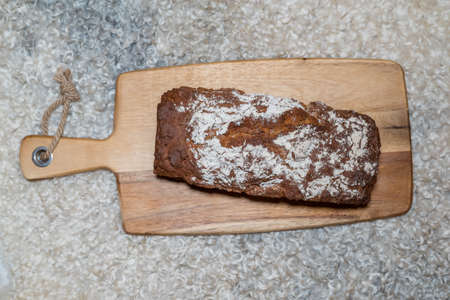 homemade loaf of bread at a sheepskinの写真素材