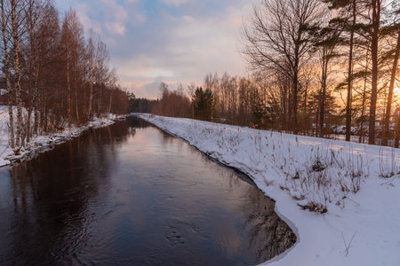 straight channel and a beautiful sunset skyの写真素材