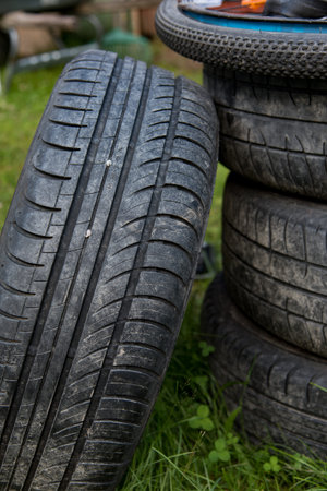 a pile of tires for cars and bikes