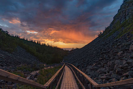 sunrise over a footbridge in fulufjallet national park Swedenの写真素材