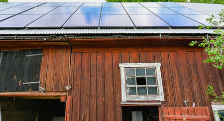 solar cells on a barn roof in Kumla Sweden summer of 2020の写真素材