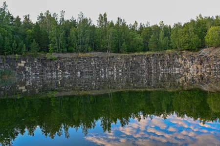 old quarry filled with water in Hallabrottet Swedenの写真素材