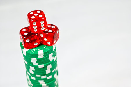 dice on a stack of poker markers