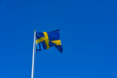 Swedish flag in blue with yellow crossの写真素材