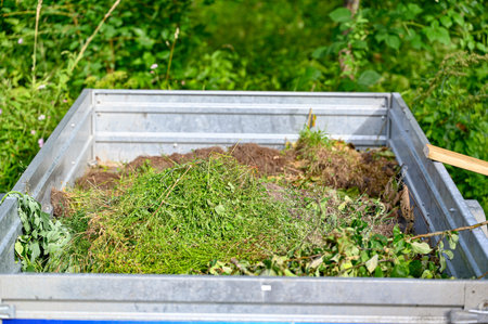green weeds collected on a small trailer