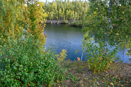 water in an old quarry viewed from aboveの写真素材