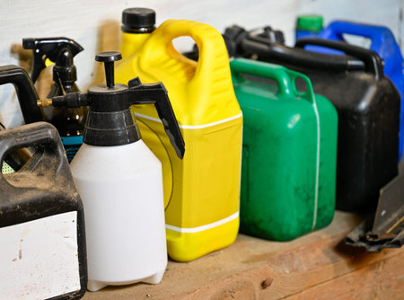 several petrol cans standing in workshop Sweden