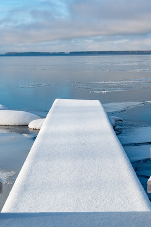 looking out over jetty and lake Vattern Swedenの写真素材