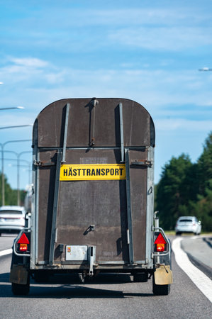 Horse trailer with sign in Swedish that means horsetransportの写真素材