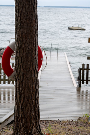 Bathing jetty in windy weather Vastanvik Motala Swedenの写真素材