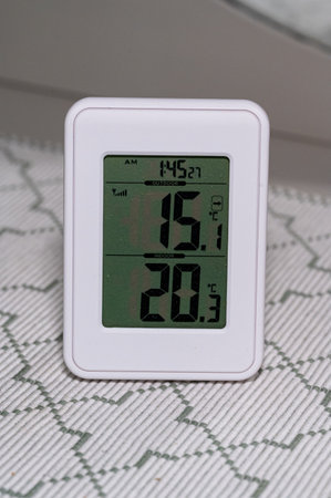 Thermometer showing indoor and outdoor degrees in Celsiusの写真素材