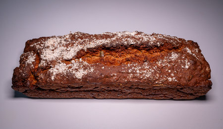 Home made loaf of bread with flour on topの写真素材