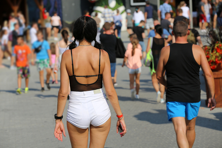 Attractive young girl is walking around the cityのeditorial素材