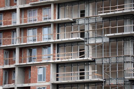 New apartments or flats for rent in concrete under construction in gray color in Europe