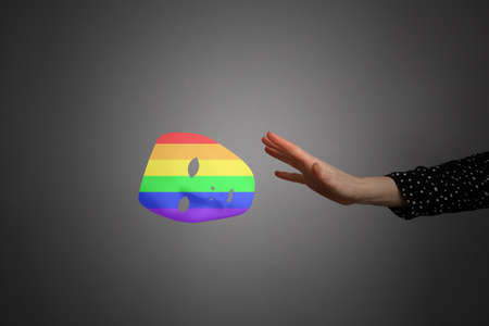 Mask with LGBT symbols rejected by a womanの写真素材
