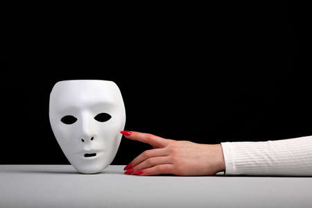 Mask is a symbol of duplicity removable after work in corporationsの写真素材