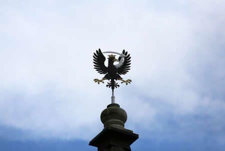 A very old eagle as an emblem on the towerの写真素材