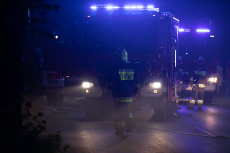 Fire brigade called to a fire in a small townの写真素材