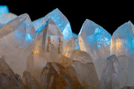 Close up of crystals of quartz on a black background. Macro.の写真素材