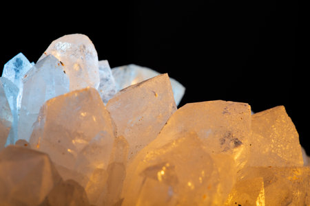 Macro shot of crystal quartz on black background with copy space.の写真素材