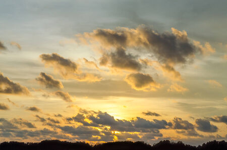 Sunset sky and silhouette mountainの写真素材