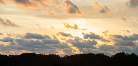 Sunset sky and silhouette mountainの写真素材
