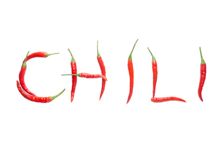 Chili letter from red chili isolated on white backgroundの写真素材