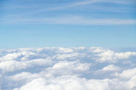 Cloud and blue sky view from airplaneの写真素材