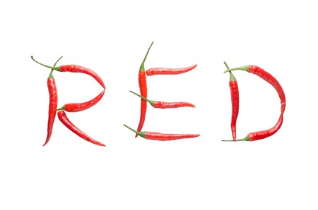 Red letter from red chili isolated on white backgroundの写真素材
