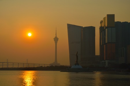 Macau, China - Jan 8, 2013: Skyline of macau city at outer harbour before sunset. The city maintains the world's highest gambling revenueのeditorial素材