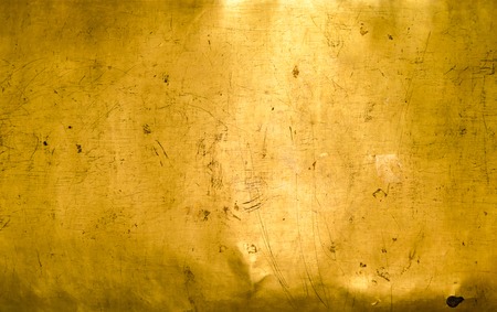 Abstract background from close up golden wall textureの写真素材