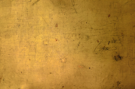 Close up old golden wall textureの写真素材