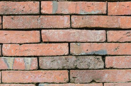 Abstract background close up red brick wallの写真素材