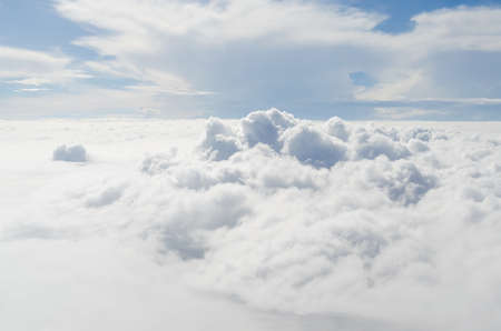 Cloud and blue sky view from airplaneの写真素材