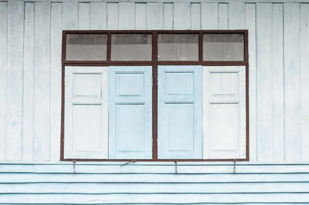Thai style windows and old wood shutters