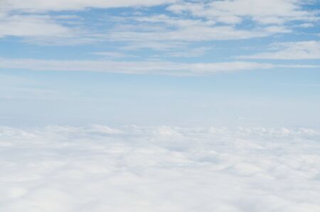 Cloud and blue sky view from airplaneの写真素材
