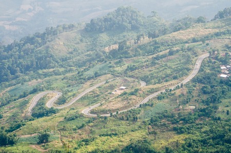 Mountain road curve to phu tub berk mountain in phetchabun thailandの写真素材