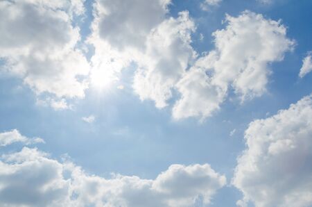 Sunshine on blue sky with white cloudの写真素材