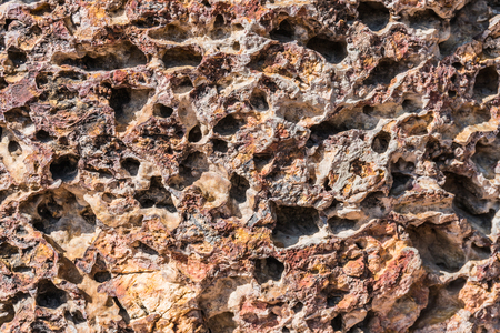 Abstract background close up weathered rock texture