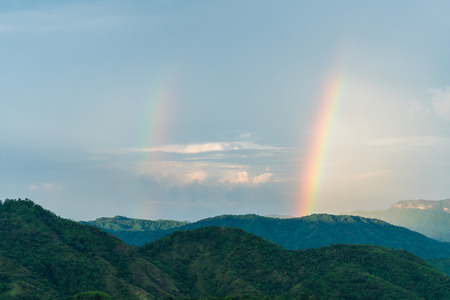 Double rainbow in the evening at Khao Kho Phetchabun Thailandの写真素材