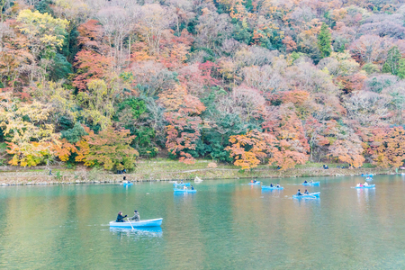 Kyoto, Japan - Nov 25, 2017: Arashiyama and Katsura river is the famous destination for tourist in autumn of japan. Many tourists sightseeing and sailing in the riverのeditorial素材