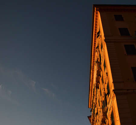 the front of a building in the sun