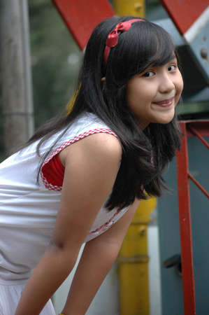 little girl with nice smile expressionの写真素材