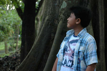 young boy with cute faceの写真素材